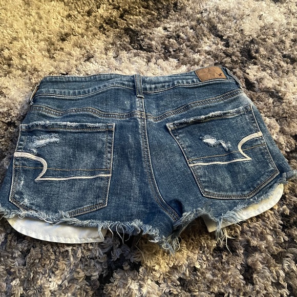 Hi-Rise Distressed Jean Shorts - Picture 9 of 9